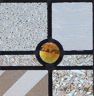 Closeup of stained and leaded glass abstract window