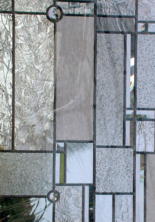 Closeup of custom abstract FLW leaded glass window