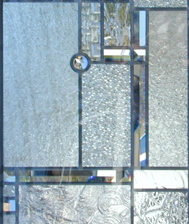 Closeup of custom abstract FLW leaded glass window