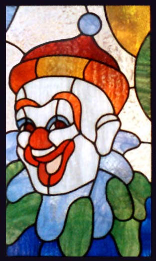 Custom stained and leaded glass clown window