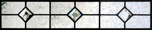 Faceted jewels in horizontal leaded glass transom window