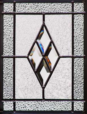 Custom leaded glass window with diamond bevels