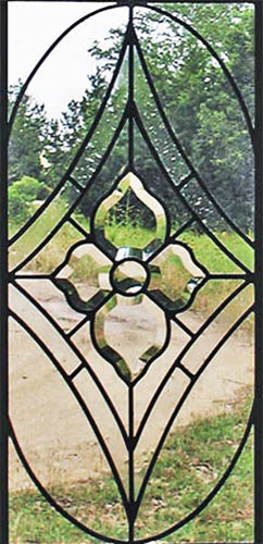 Closeup of clear leaded glass sidelight window with bevels