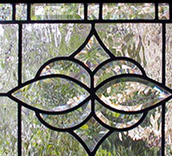 Closeup of leaded glass bevel transom window custom glass design