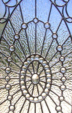 Custom leaded glass jeweled window