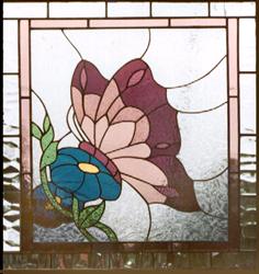 stained glass butterfly and flower window