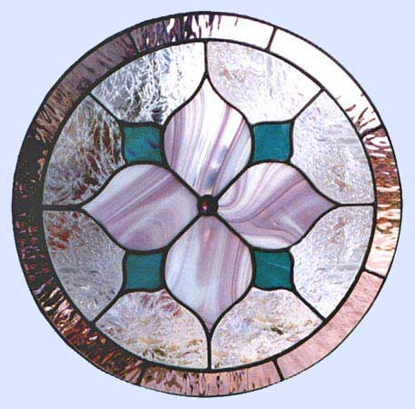 Custom stained and leaded glass mauve Victorian–style circle window