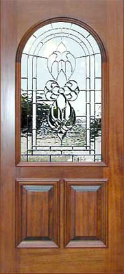 Custom arched mahogany door with custom leaded glass bevel window