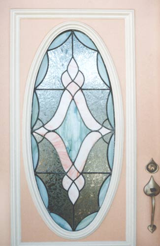 Closeup of stained and leaded glass custom door window