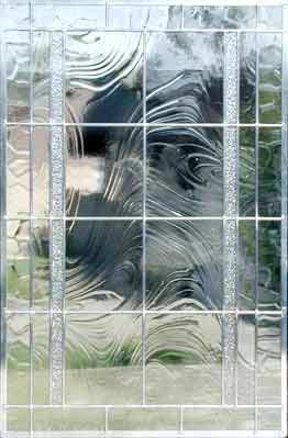 large custom leaded glass window of clear textured glasses