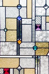 Closeup of Frank Lloyd Wright inspired custom stained and leaded glass window