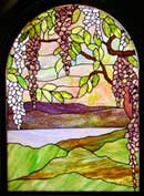 Custom wisteria arched stained glass window by Jack McCoy