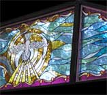 Custom stained and leaded glass window for a private chapel
