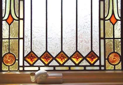 detail of Visconte Victorian style stained and leaded glass window